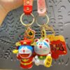 Two blue cat keychain styles with metal rings and hanging straps