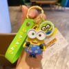 Surprised yellow buddy keychain with green strap