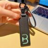 B initial leather keychain in black