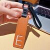 E initial leather keychain in brown