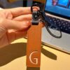 G initial leather keychain in brown