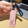 K initial leather keychain in pink