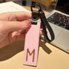 M initial leather keychain in pink