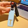 T initial leather keychain in blue