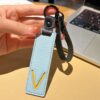 V initial leather keychain in blue