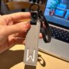W initial leather keychain in gray