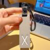 X initial leather keychain in gray